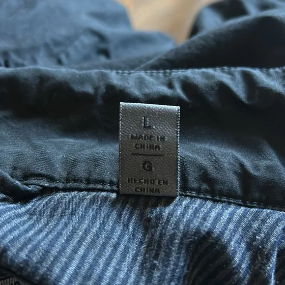 Levi Strauss black Wind/ rain coat longer hem on back. Draw strings also. EUC. - Picture 3 of 13